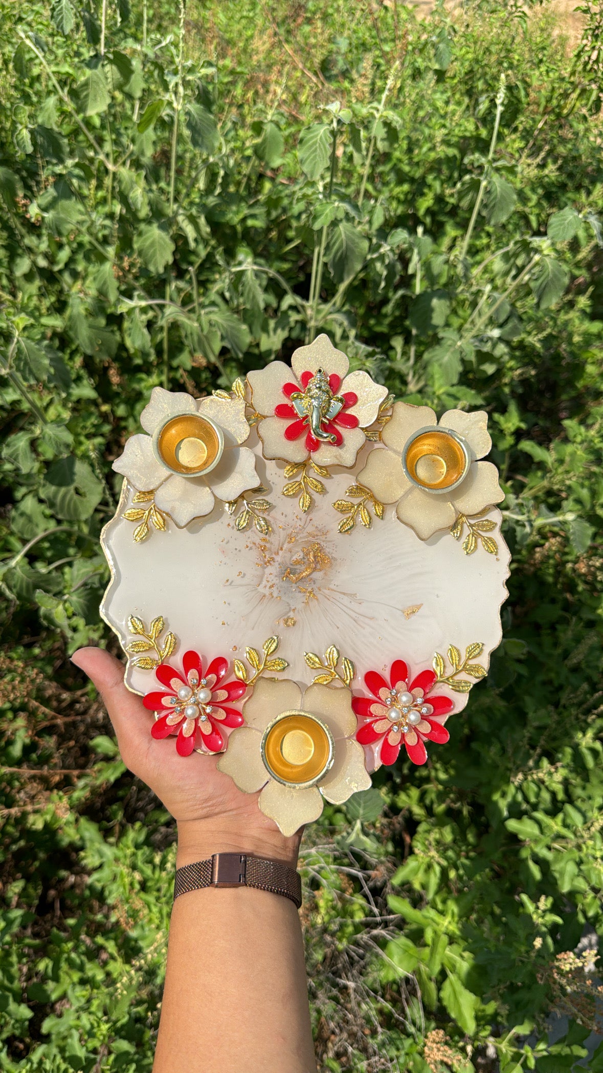 White floral Ganesha decorative platter with three tealight holders, red flowers, pearls and gold detailing