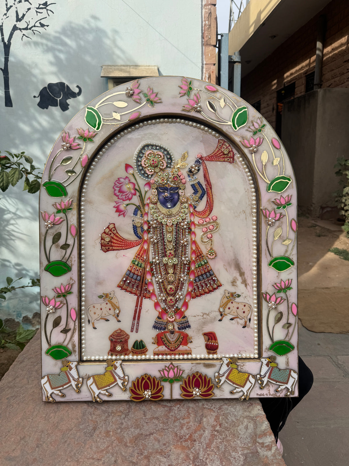 Handcrafted Shreenathji Pichwai arch wall decor with pearl border, lotus motifs and floral embellishments