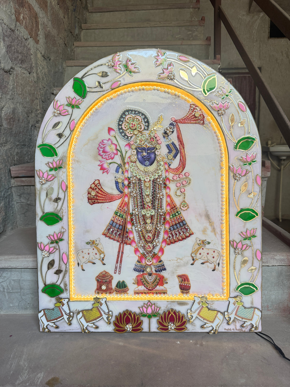 Handcrafted Shreenathji Pichwai arch wall decor with pearl border, lotus motifs and floral embellishments