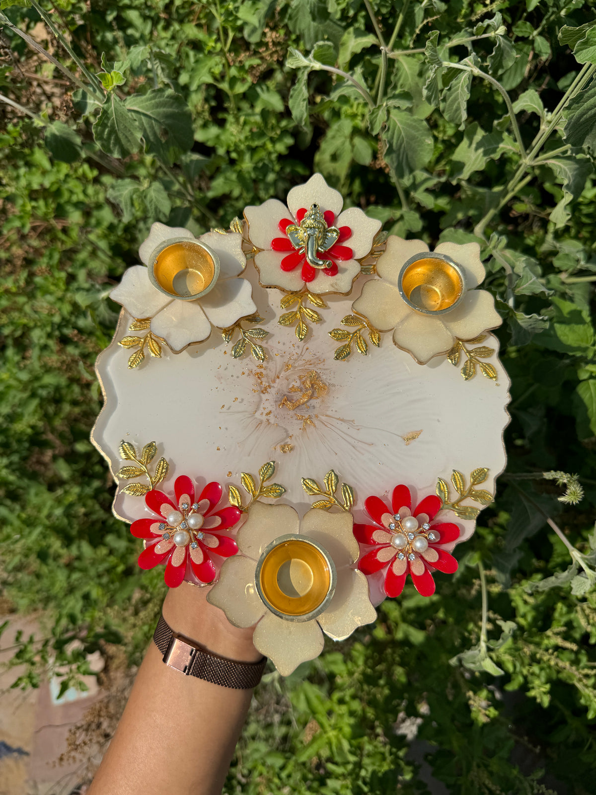 White floral Ganesha decorative platter with three tealight holders, red flowers, pearls and gold detailing