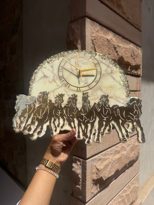 Handcrafted marble effect wall clock with Roman numerals, gold hands and running horse silhouette